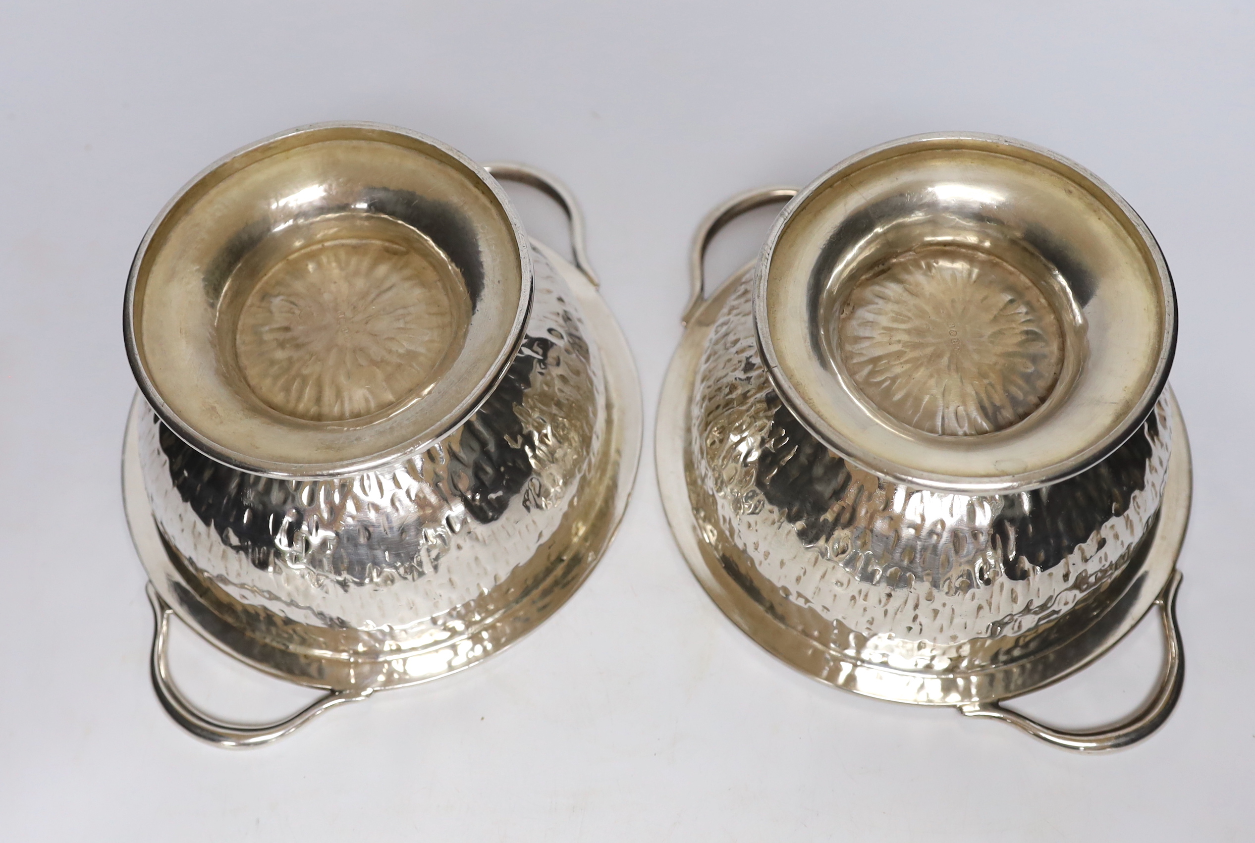 A pair of Hukin & Heath plated tureens and covers, attributed to Christopher Dresser, stamp to the bases, 27cm wide